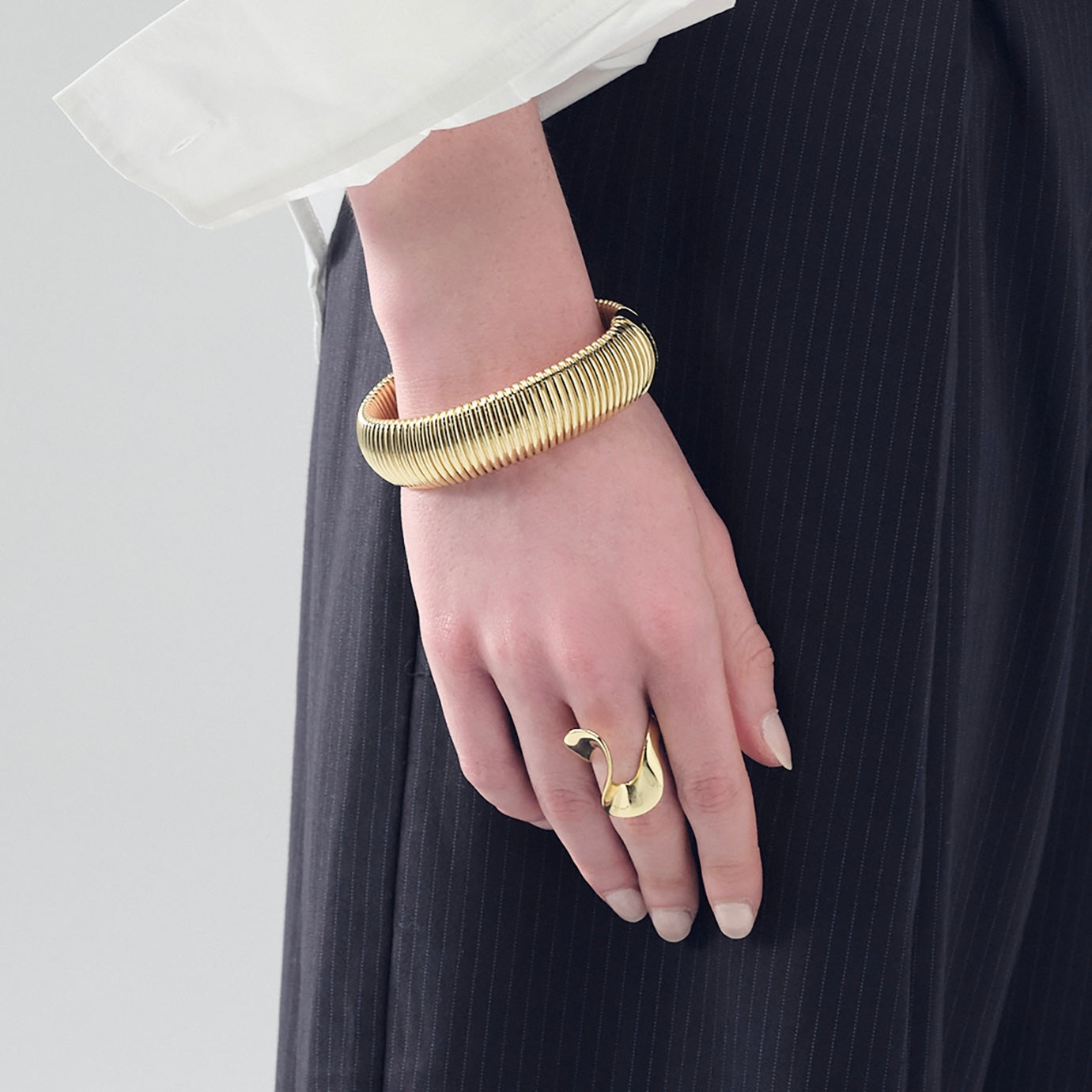 Unoaerre bracciale dorato a fascia tubogas