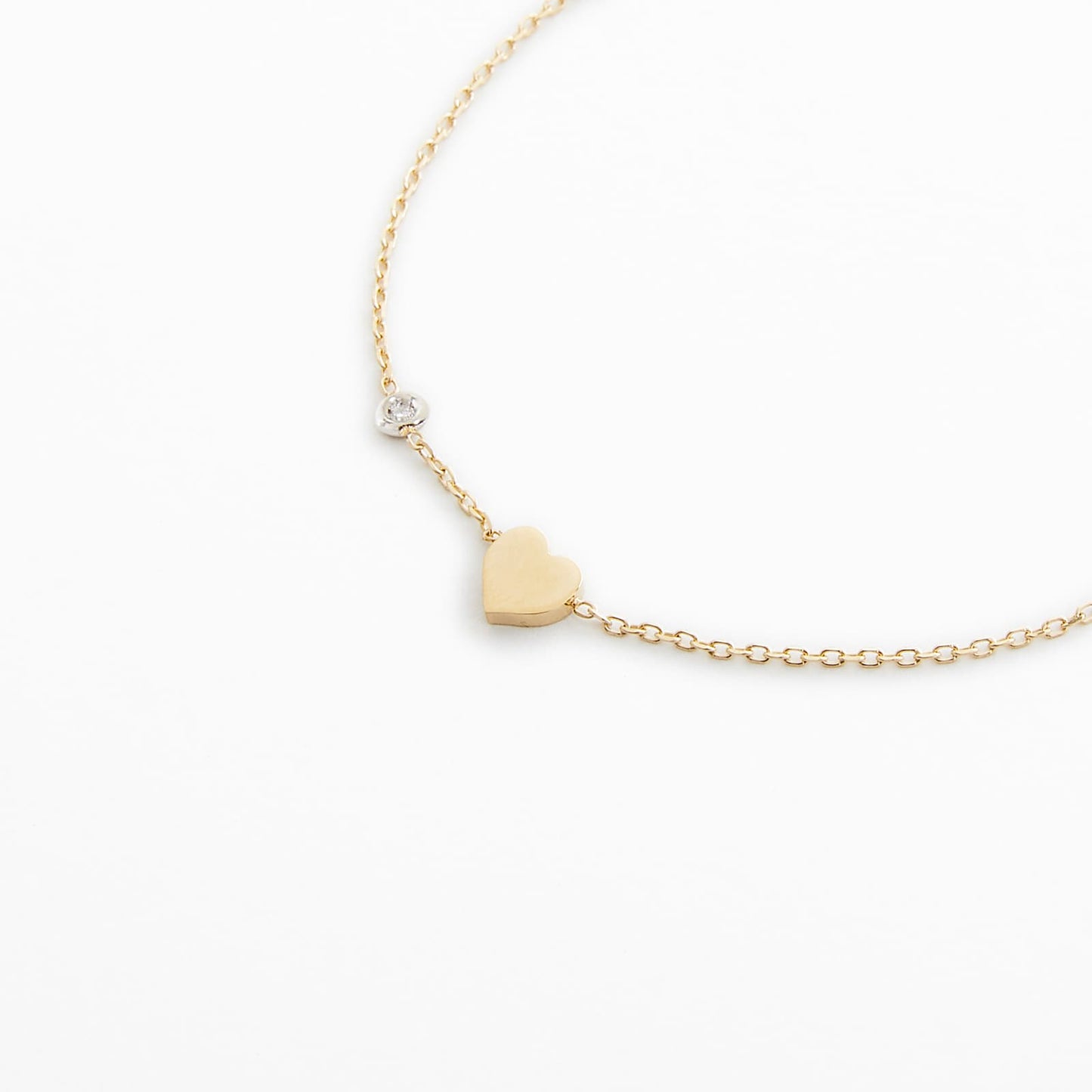 Bracciale in oro con cuore e diamanti