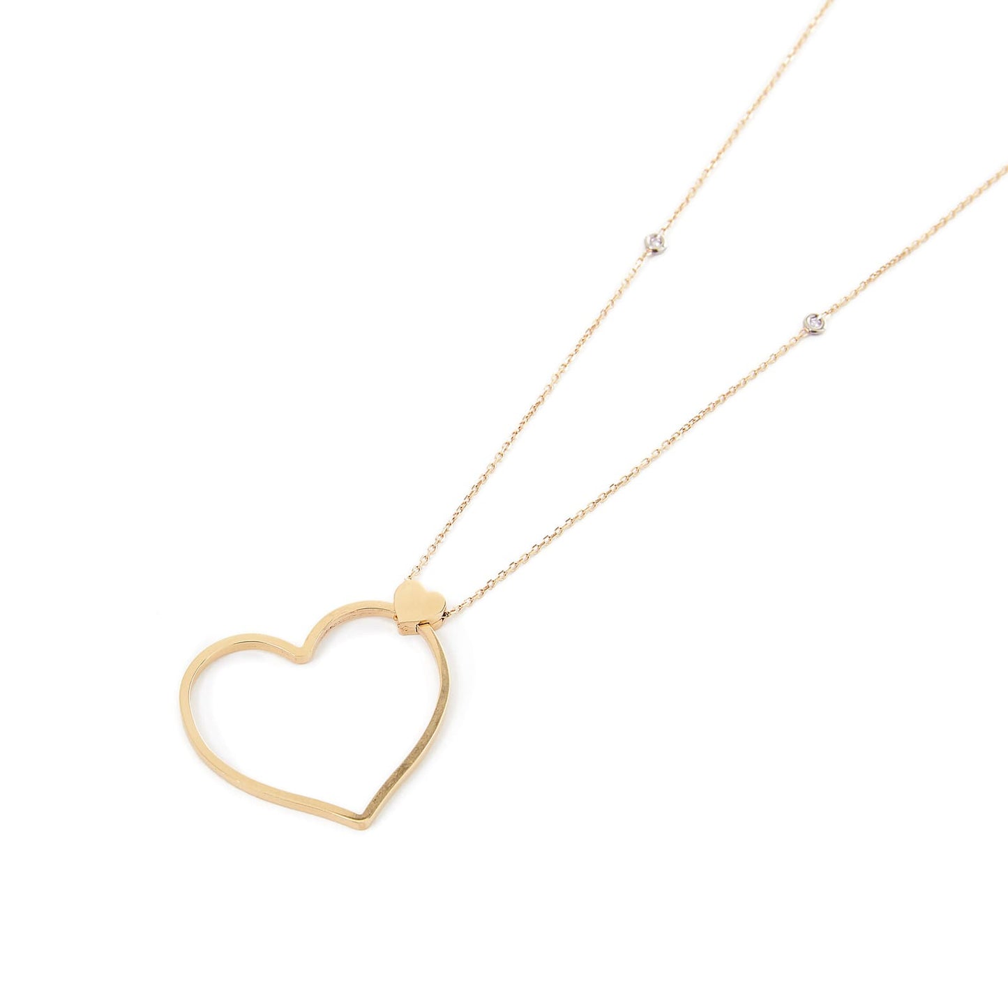 Collana lunga in oro con cuore diamanti