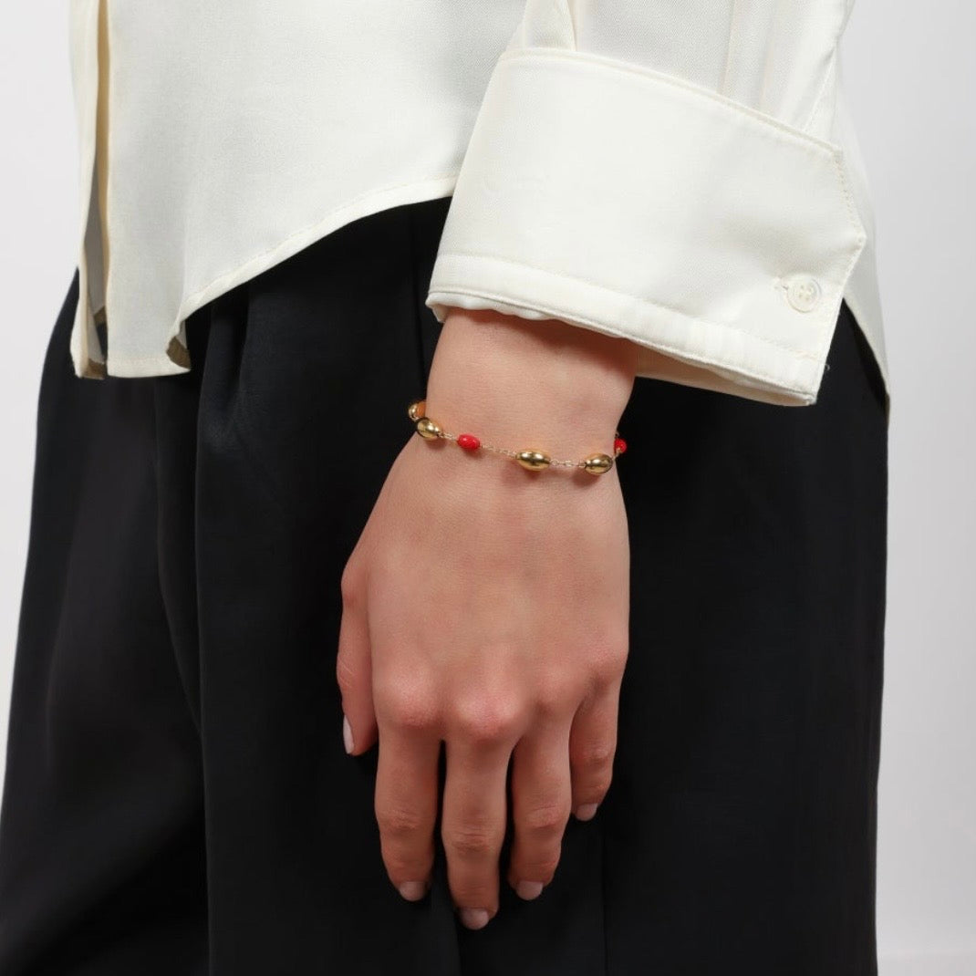 Unoaerre bracciale boule in argento dorato e corallo