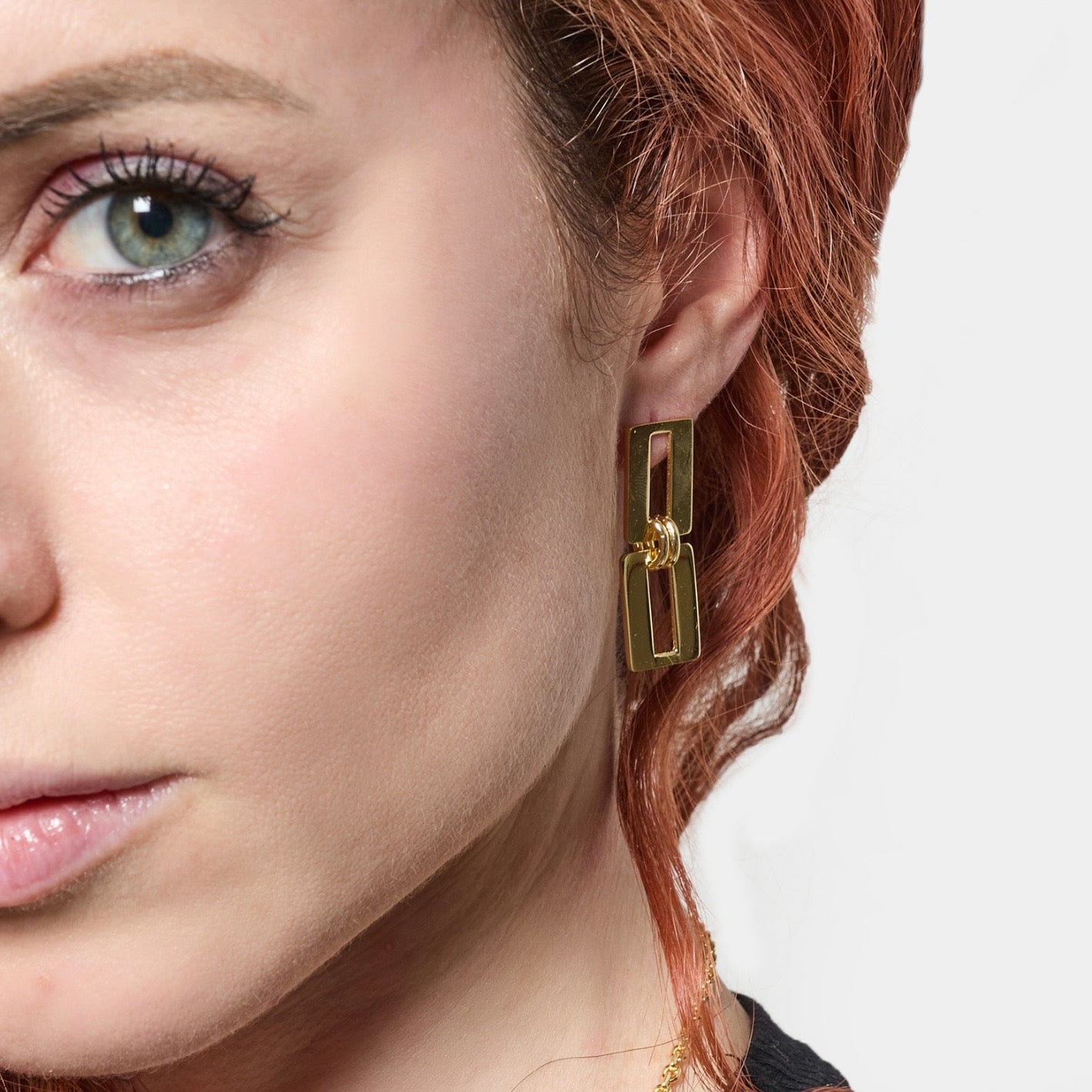 Unoaerre orecchini catena dinamica dorati